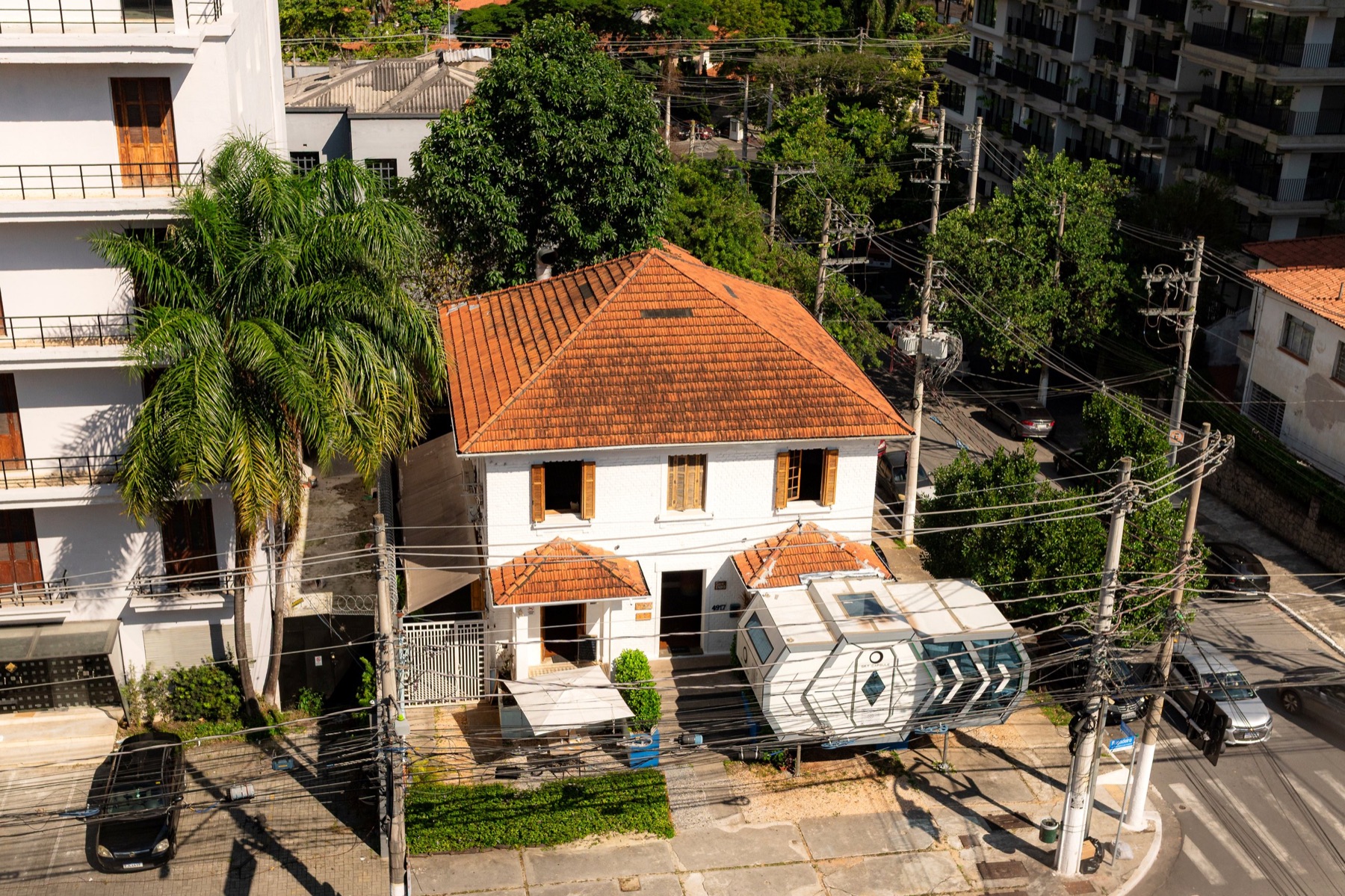 Aerial side view of AI House Brasil with the Sky Capsule
